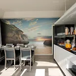 Golden Beach Guest House & Rooftop Bar
